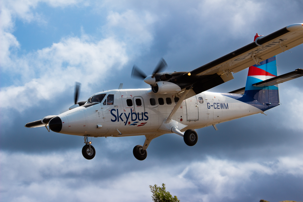 Skybus De Havilland Twin Otter landing at St Mary's Airport